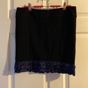 Kensie Girl black skirt with purple ruffles on bottom